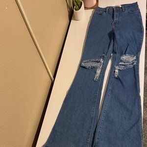 Classic Blue Flare Jeans with Distressed Details